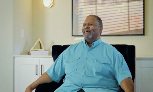 a man sitting down